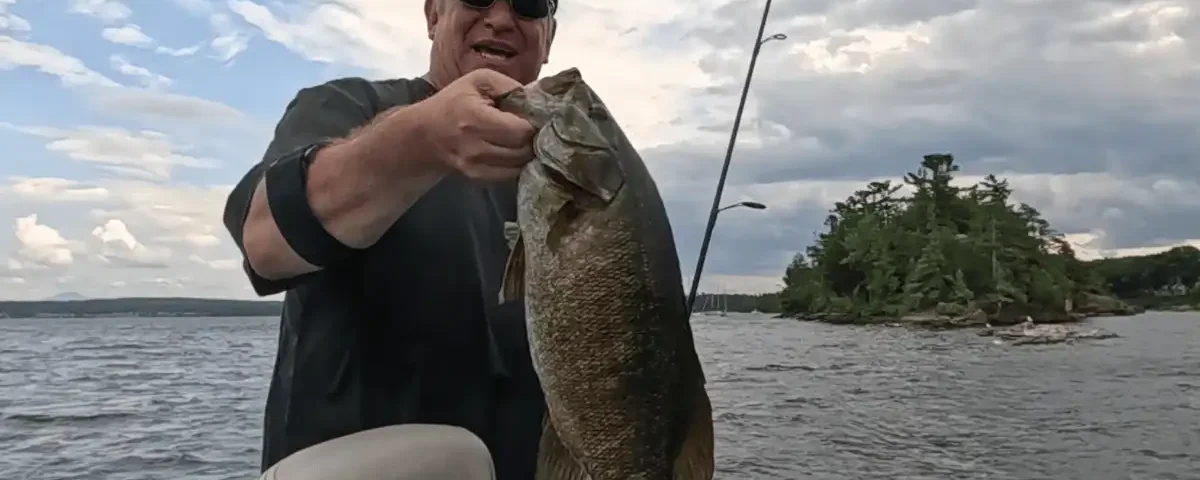 Post-spawn smallmouth bass caught on Champlain using 2.8” Keitech and spinning gear