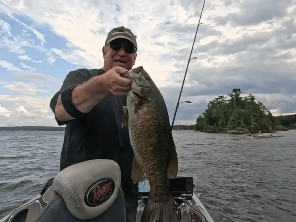 Post-spawn smallmouth bass caught on Champlain using 2.8” Keitech and spinning gear