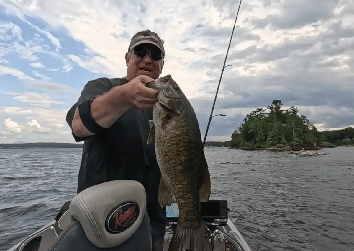 Post-spawn smallmouth bass caught on Champlain using 2.8” Keitech and spinning gear